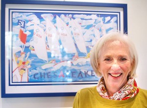 Nancy Hammond poses with her Chesapeake-themed 2011 poster release. (PHOTO BY M. J. NEUBERGER)
