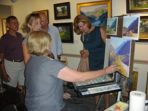 Lisa Mitchell, demonstrating painting a pastel landscape at McBride Gallery in a previous year's Annapolis Art Walk