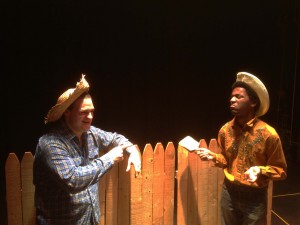 Erik W. Alexis of Millersville, left, as Huckberry Finn appears unconvinced by John Patterson as Tom Sawyer that white-washing the fence is something he would enjoy in one of the book’s signature scenes.