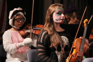 Students of South River High School join the Londontowne Symphony Orchestra in playing Halloween-themed classical music.