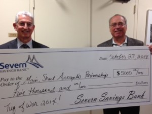 Alan Hyatt (l) of Severn Savings Bank presents a check to Steve Samaras (r), President of MainStreets Annapolis and owner of Zachary's Jewelers. 