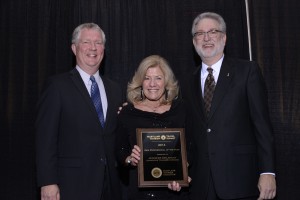 Jennifer DeLancey, center, accepts the “New Professional of the Year” Award from the Maryland Tourism Coalition at the Maryland Tourism & Travel Summit Awards Banquet held at the Ocean City Convention Center on Thursday, November 14th.