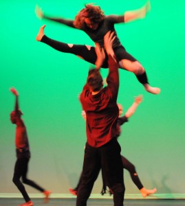 Members of the AACC Dance Company rehearse overhead movements in preparation for the Dec. 4-6 p.m. performances.