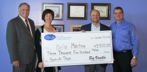 (L to R) Dr. Robert T. Ireland, President & CEO of Bello Machre, Tracy Lynott, Development Director of Bello Machre with Larry Ray, Owner of Big Vanilla and Mike Hine, General Manager of Big Vanilla.