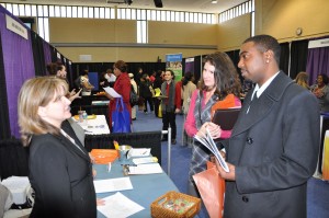Jobseekers talk with representatives of one of the employers at a recent Anne Arundel Community College Job Fair. The AACC Spring 2015 Job Fair will be April 16, in the David S. Jenkins Gymnasium on AACC's Arnold campus, 101 College Parkway. See http://www.aacc.edu/careers/employmentservices/jobfair.cfm for more information.