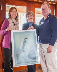 Cynthia McBride, center, owner of McBride Gallery, displays “White Elegance” (egret), a signed and numbered giclee print on canvas by Matthew Hillier, donated by the gallery for the Rotary Club of Annapolis silent auction on March 7 from 6 to 10 p.m. at the Westin Annapolis Hotel. The gallery also is donating a custom framing gift certificate. Also shown are Elaine Shanley, left, and Dave Cordle, co-chairmen of the gala to benefit the Connected Warrior Foundation. For tickets, visit www.annapolisrotary.org.