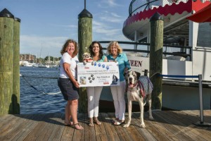 Watermark presents a check for $1,462.50 to the Anne Arundel County SPCA from the 3rd Annual Dog Days of Summer Cruise. (l to r) Director of Sales and Marketing at Watermark April O’Brien, AACSPCA President Kelly Brown, and Group Sales Account Manager at Watermark Jennifer DeLancey. Photo by Sabrina Raymond.