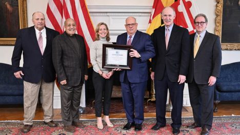 HA President and CEO Karen Brown presents a 2022 Preservation Award to Governor Larry Hogan, with Jeff Brown of Lewis Contractors, HA Trustees Carroll Hynson and Jim Reid, and HA Senior Vice President Michael Day. Photo courtesy of the Governor's office.